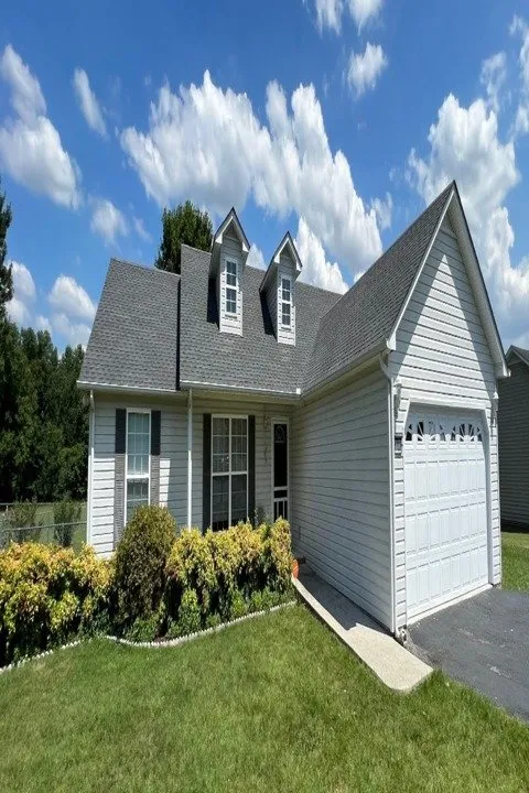 Slide of Risher Roofing