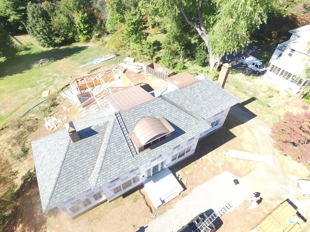 Slide of Rising Star Roofing