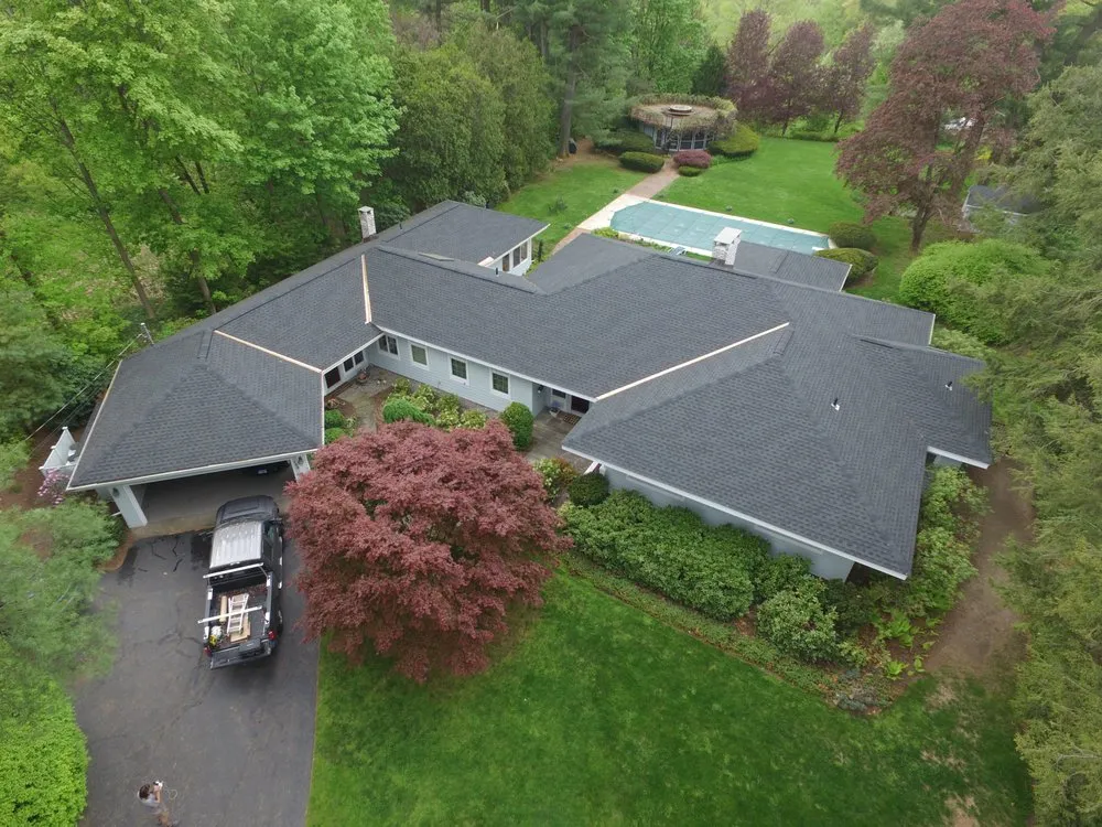 Slide of Rising Star Roofing