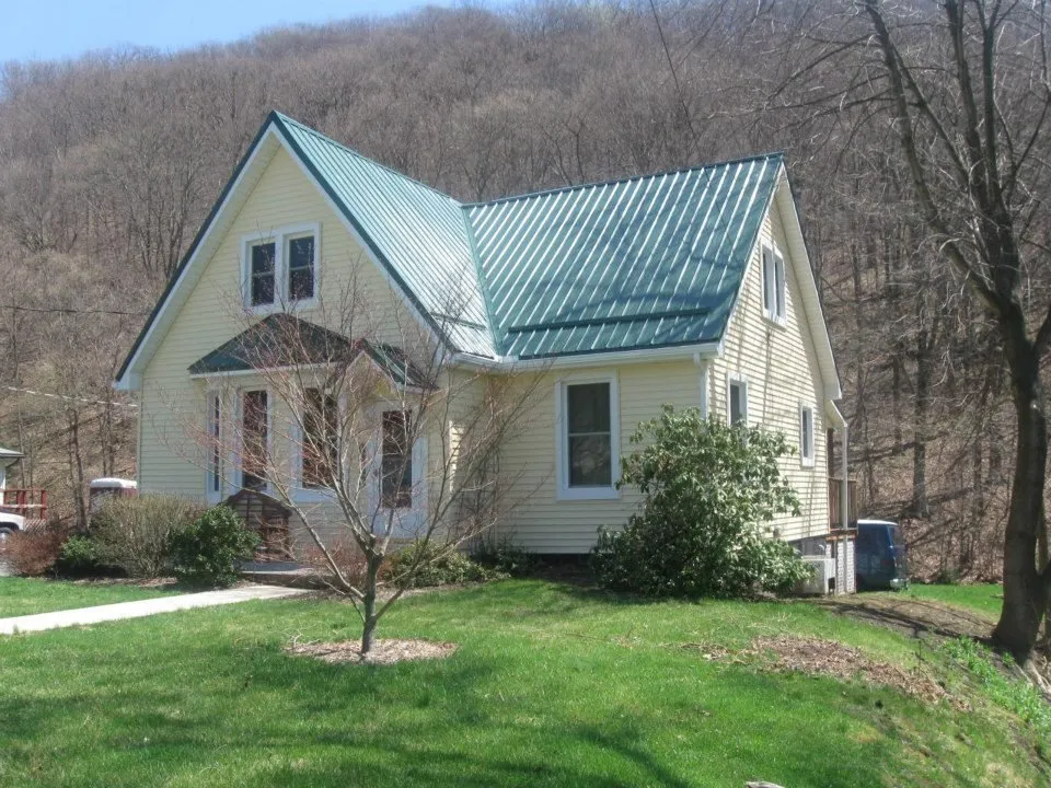 Slide of Rissler All-Weather Roofing & Repair