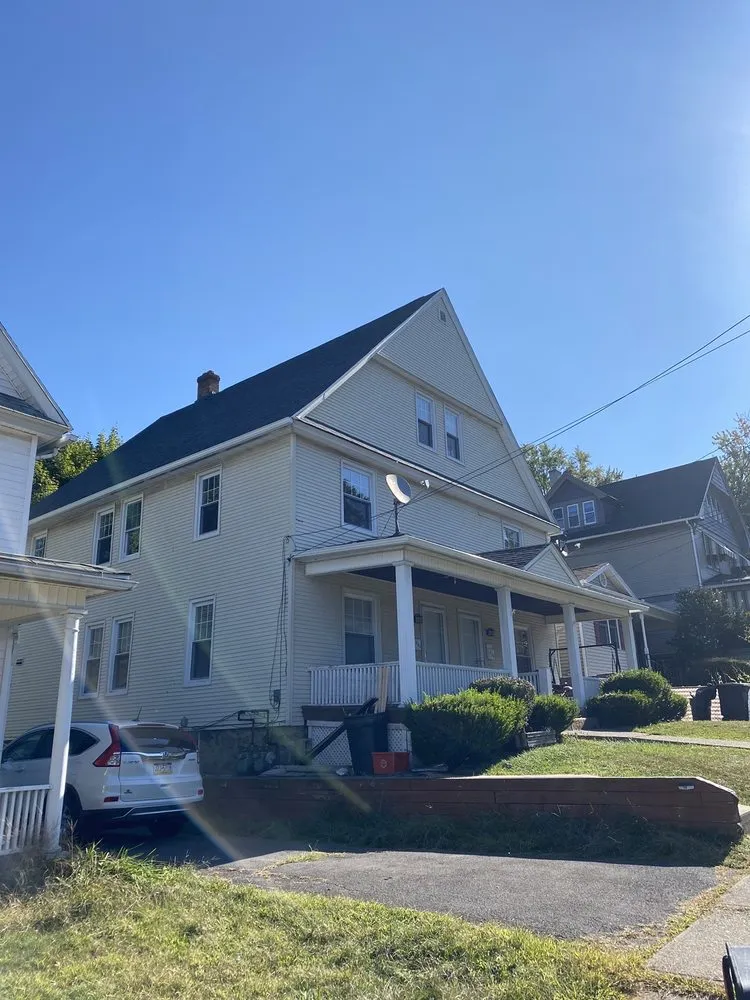 Slide of Ritter's Roofing