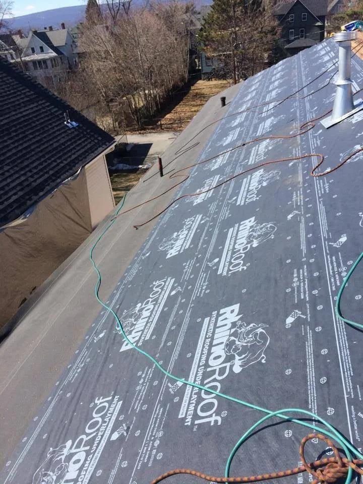 Slide of Ritter's Roofing