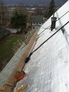 Slide of Ritter's Roofing