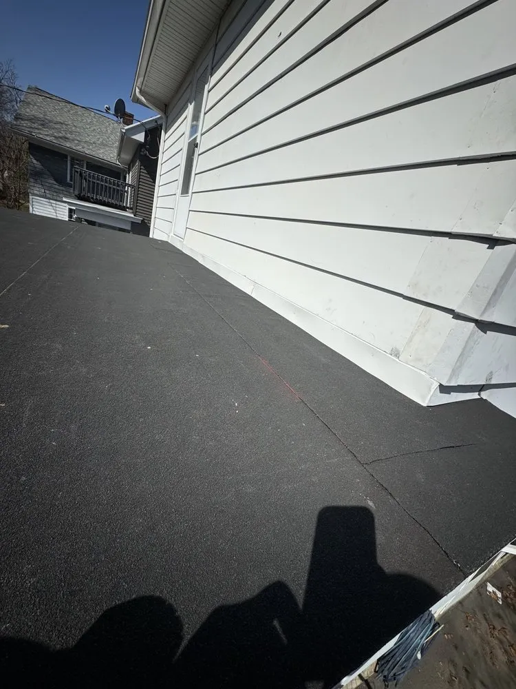 Slide of Rivas Roofing & Exteriors