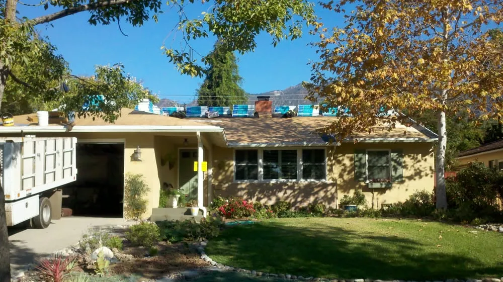 Slide of Rivas Roofing