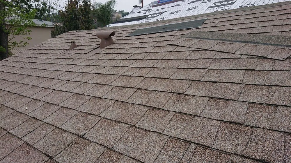 Slide of Rivas Roofing