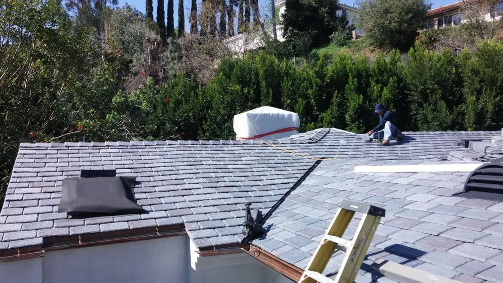 Slide of Rivas Roofing