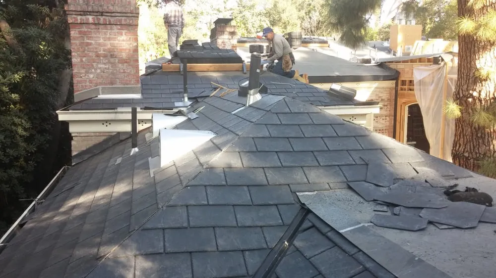 Slide of Rivas Roofing