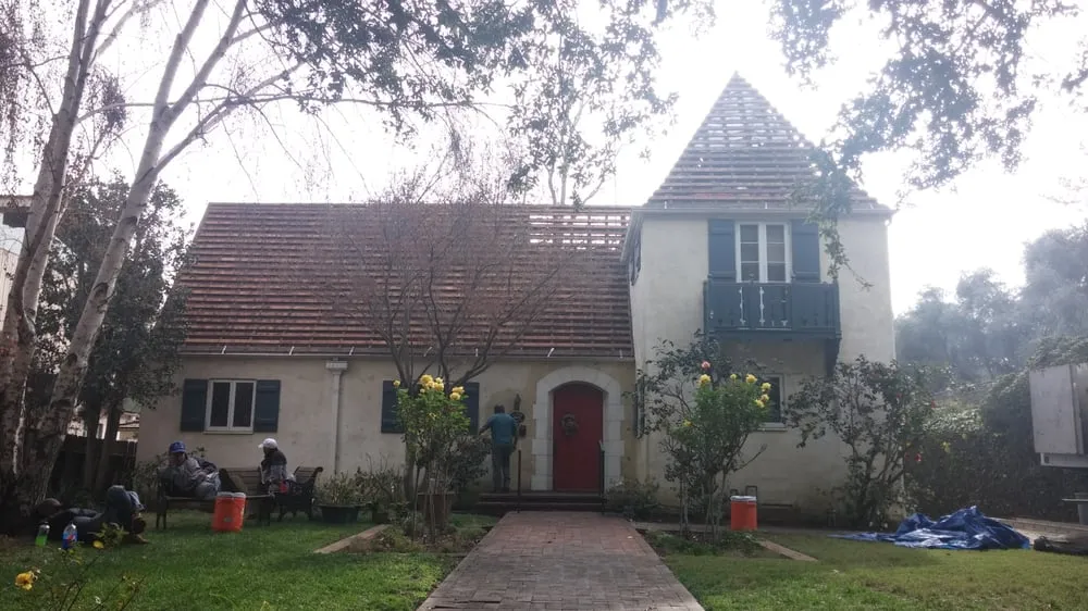 Slide of Rivas Roofing