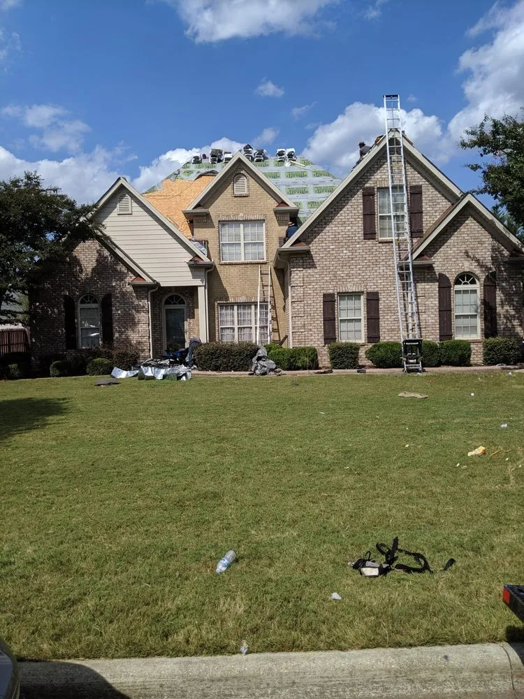 Slide of River City Roofing