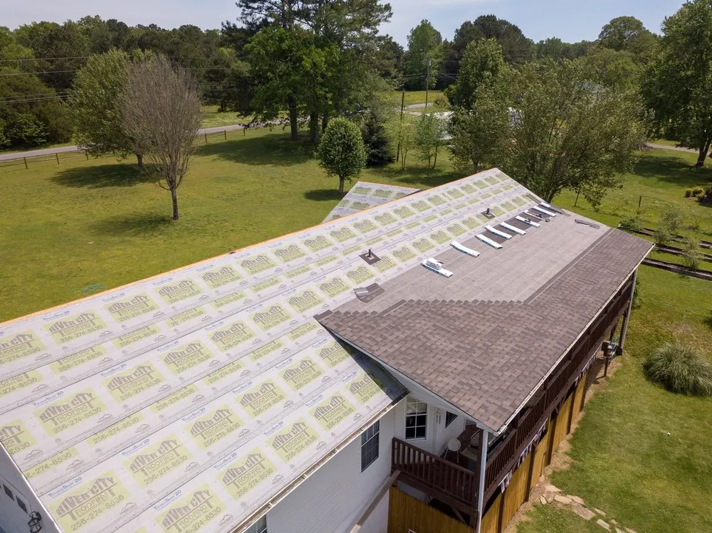 Slide of River City Roofing