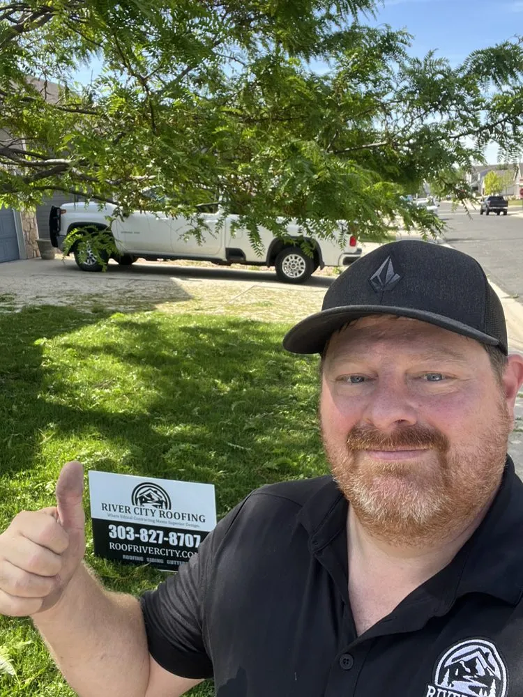 Slide of River City Roofing