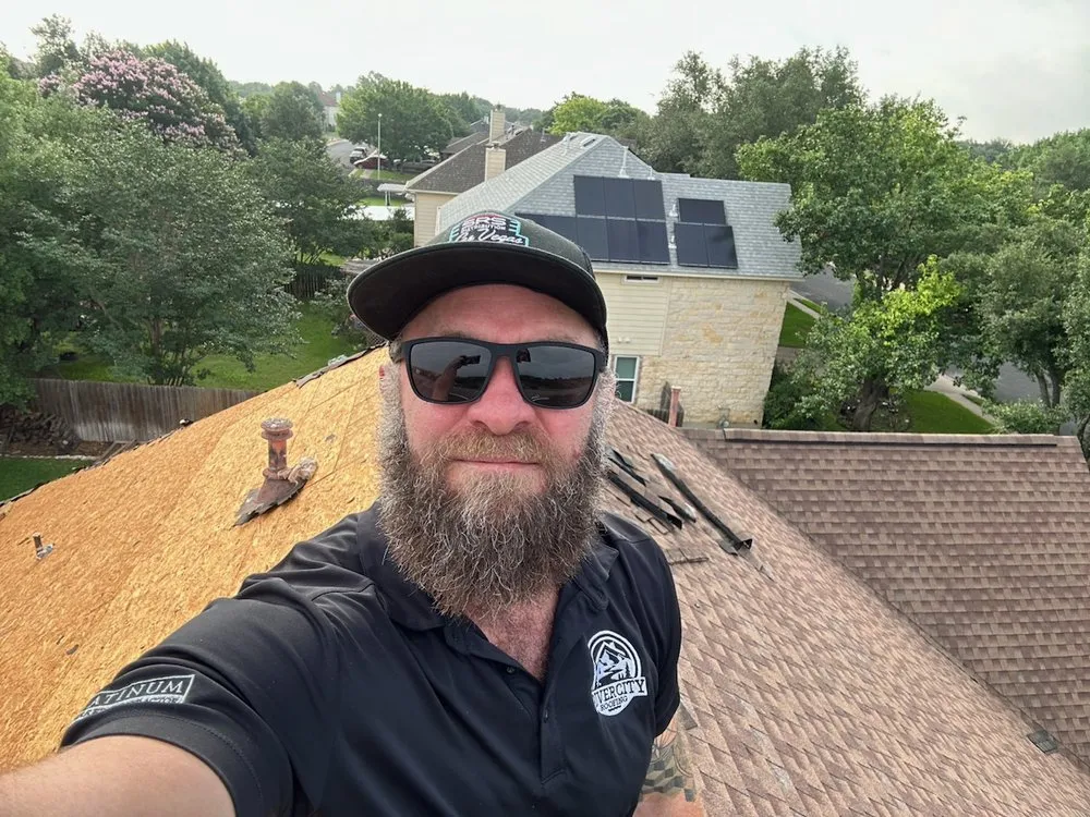 Slide of River City Roofing