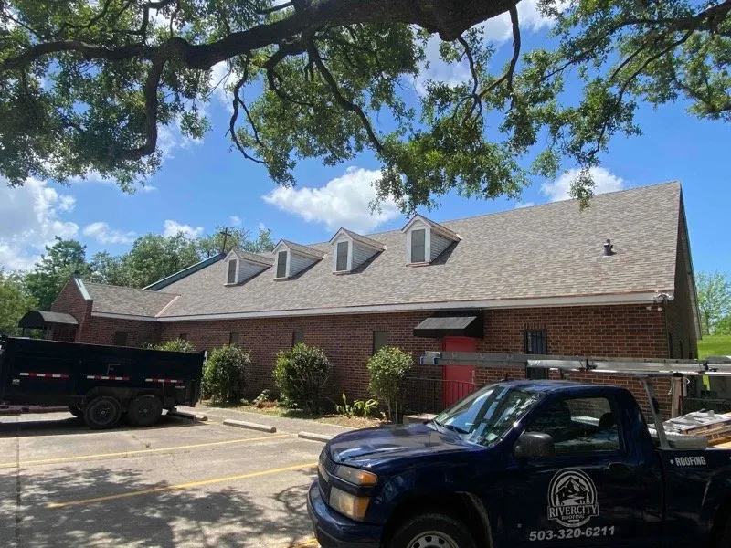 Slide of River City Roofing