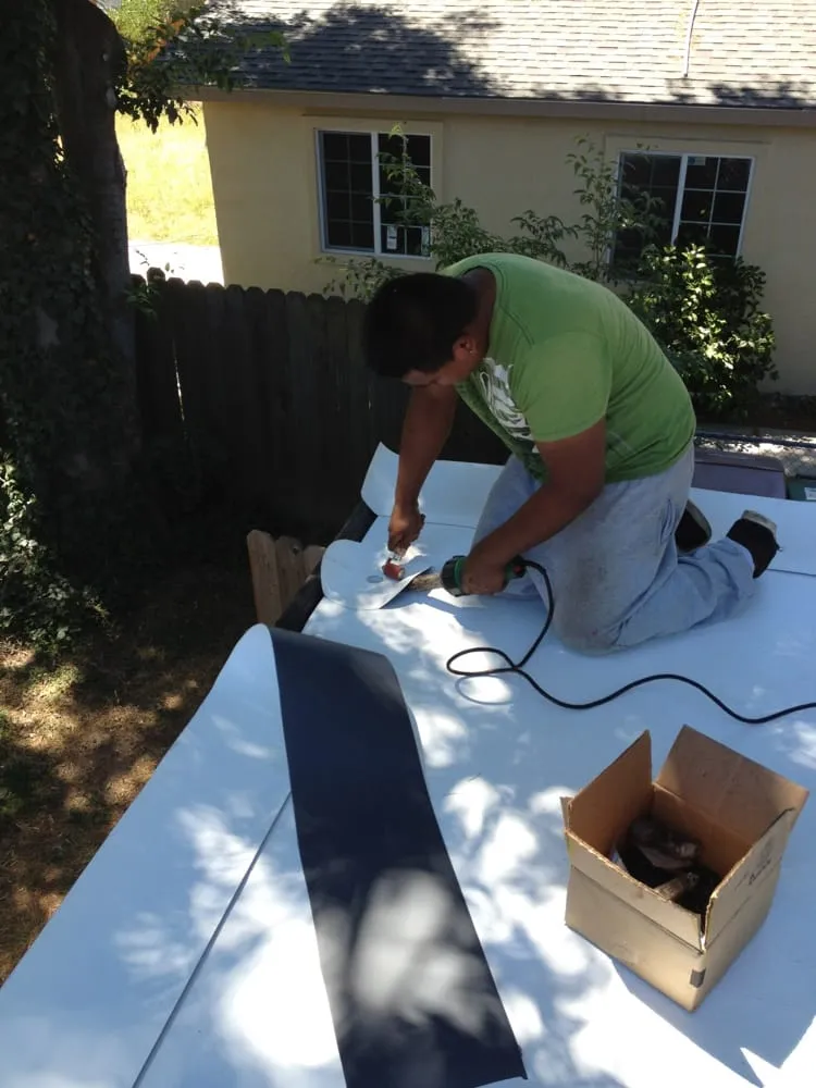 Slide of River City Roofing