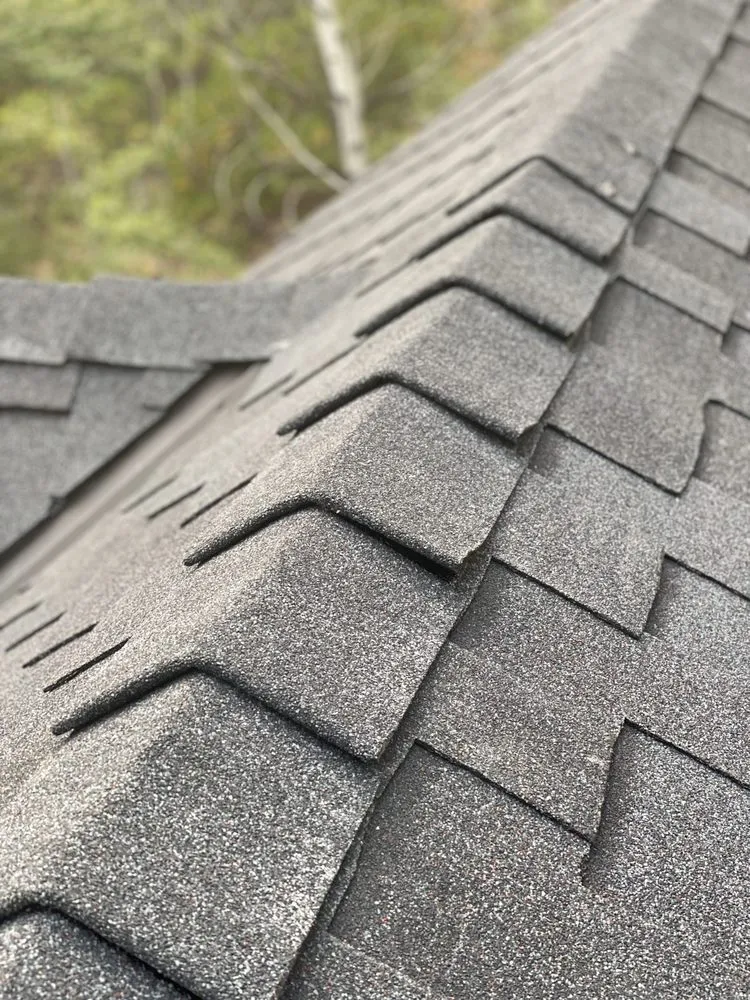 Slide of River Mountain Roofing