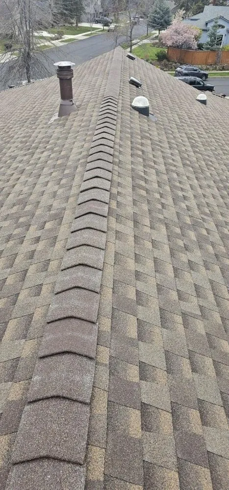 Slide of River Mountain Roofing