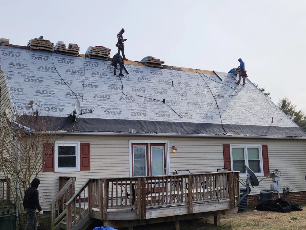 Slide of River Oakes Roofing