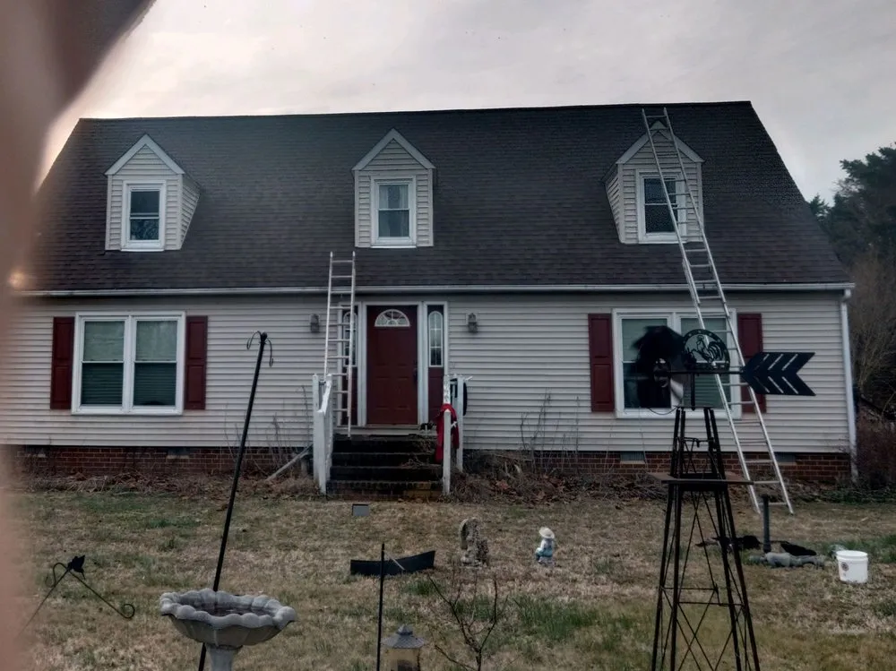 Slide of River Oakes Roofing