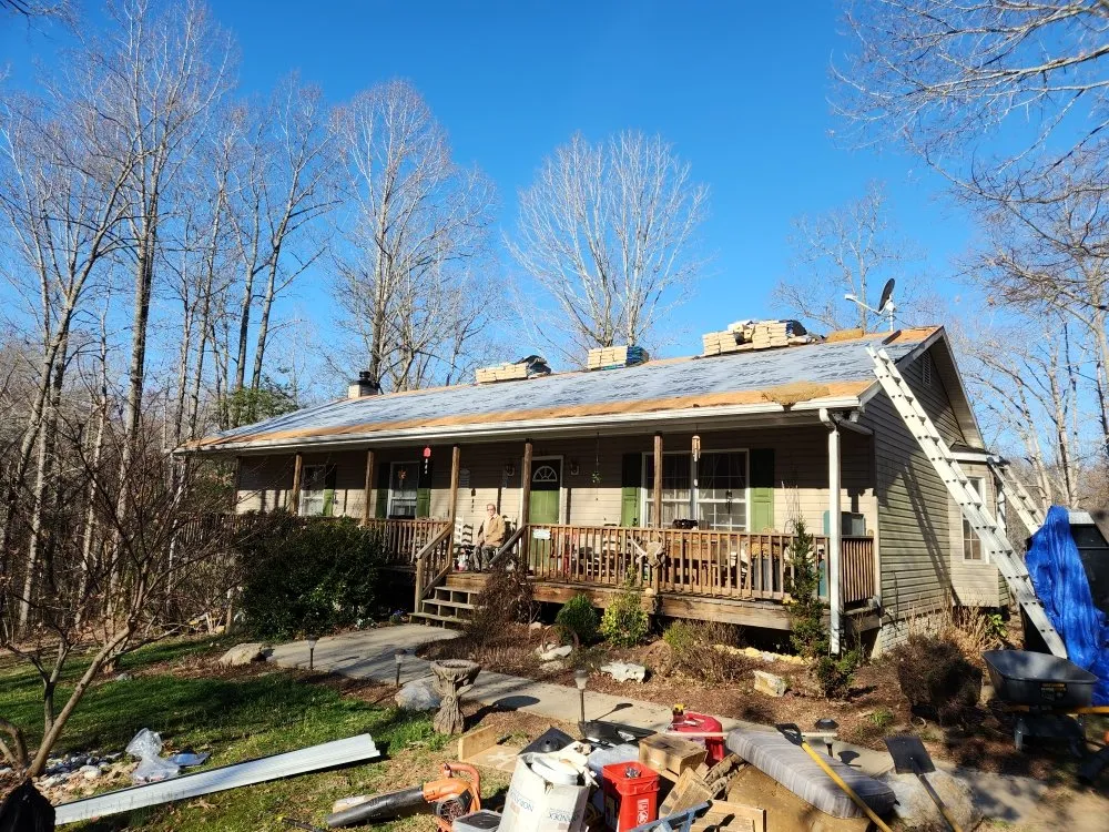 Slide of River Oakes Roofing