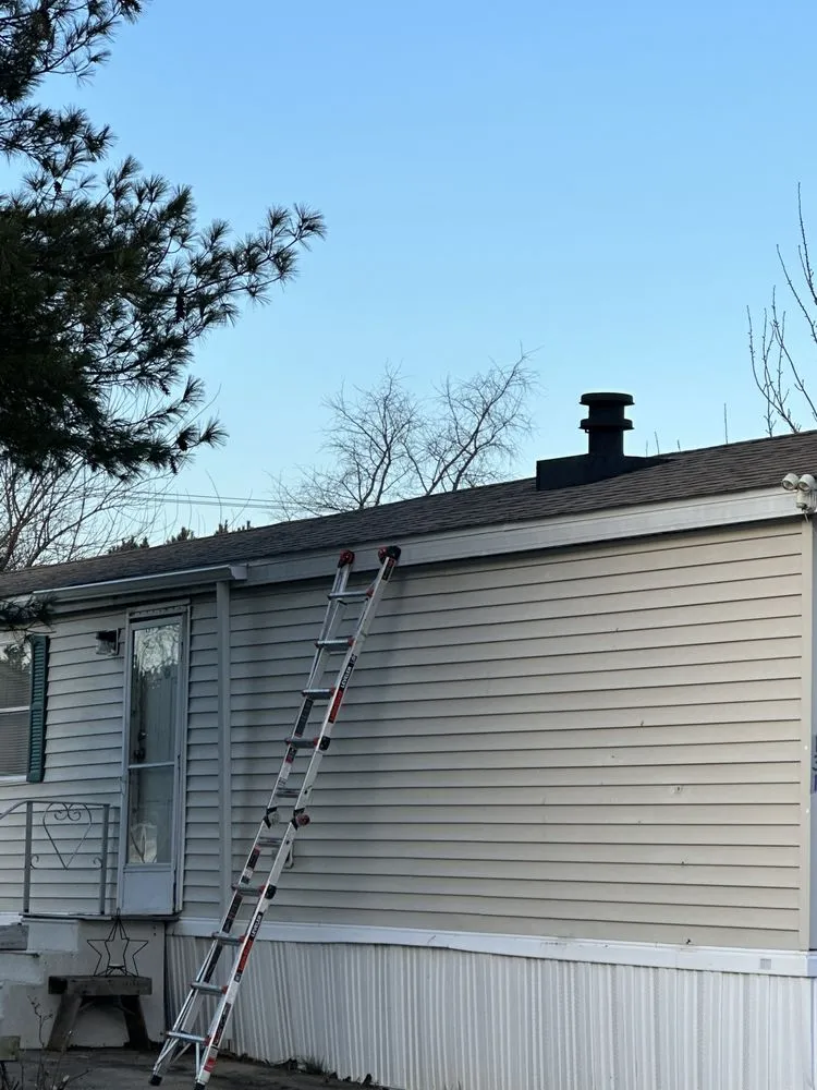 Slide of River to Bay Roofing and Exteriors