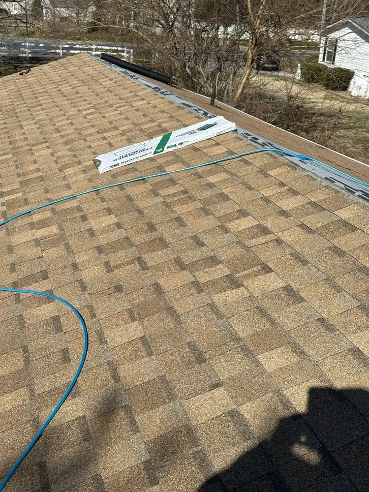 Slide of River to Bay Roofing and Exteriors