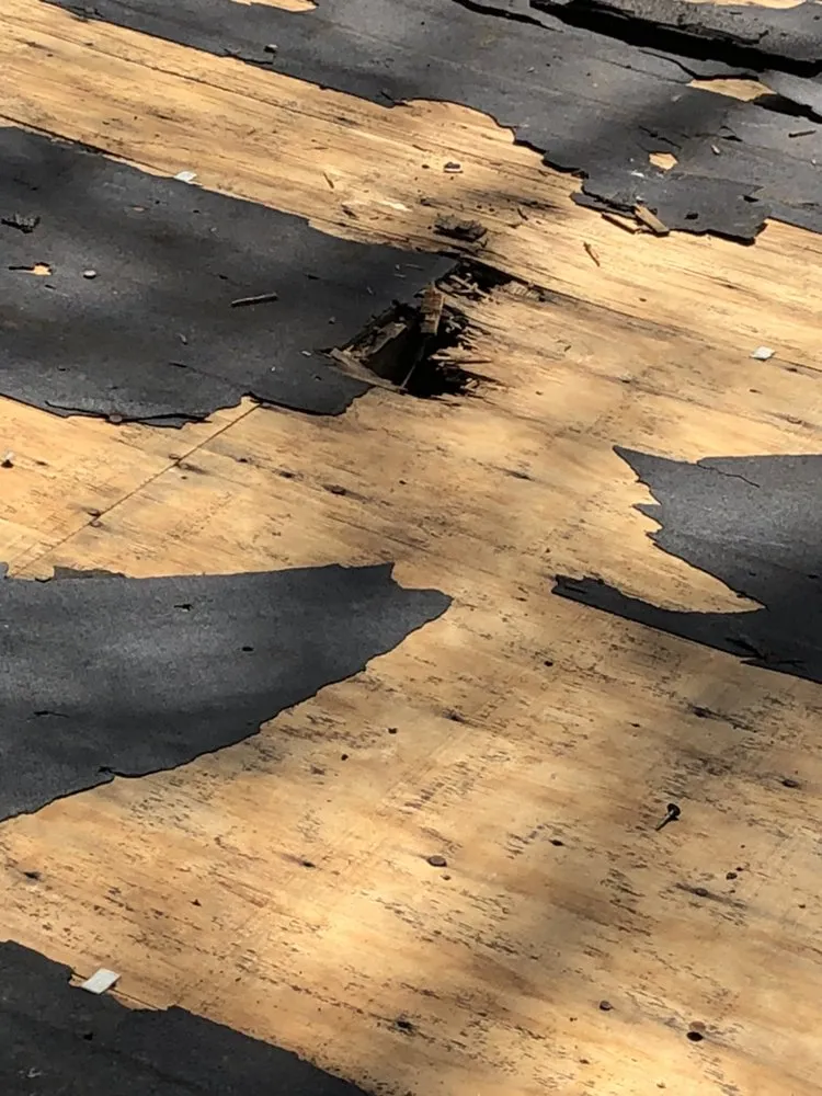 Slide of River Wolf Roofing