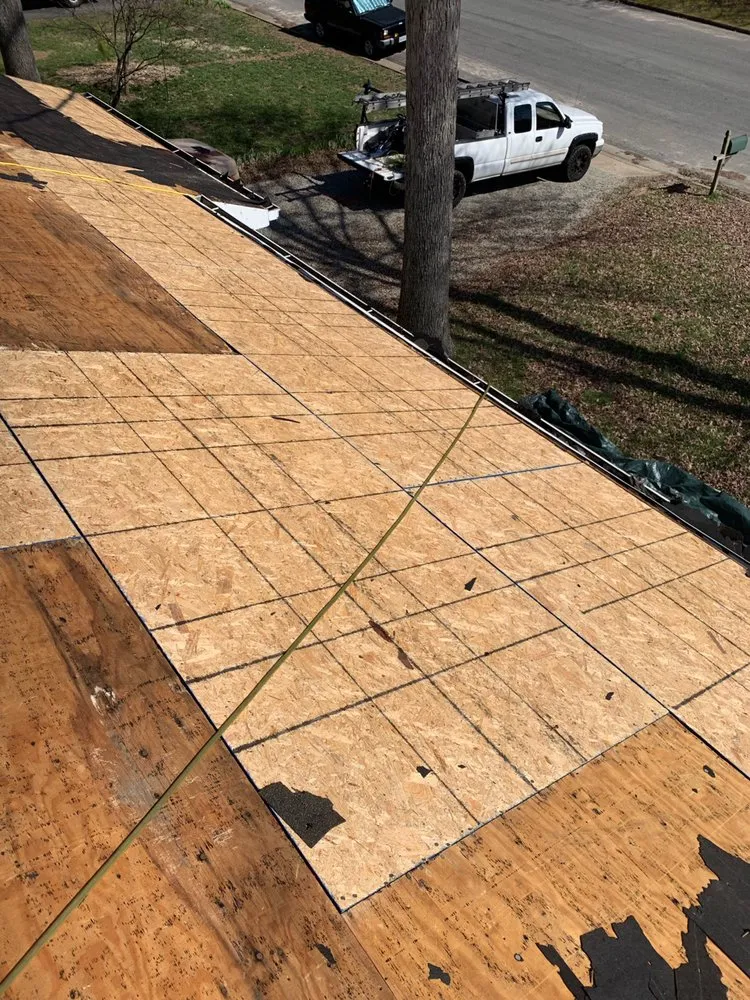 Slide of River Wolf Roofing