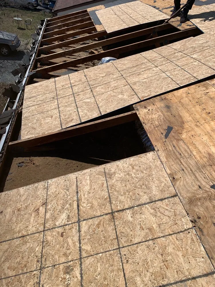 Slide of River Wolf Roofing