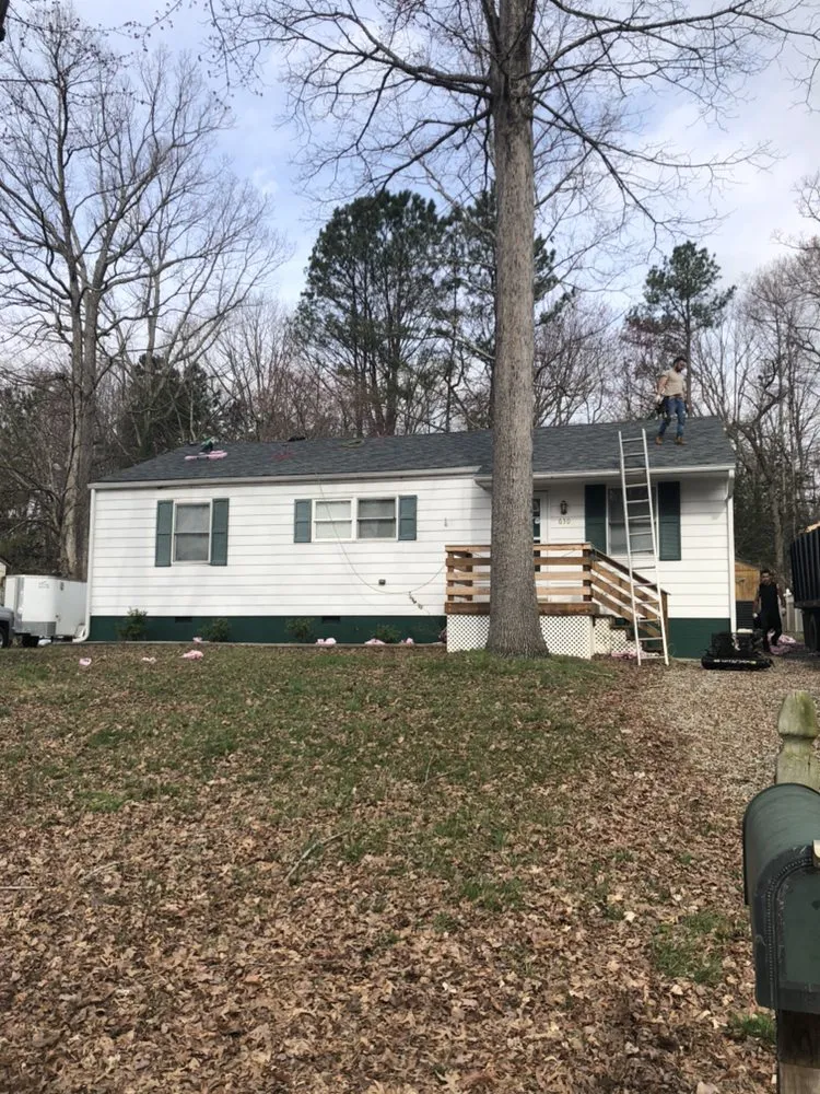 Slide of River Wolf Roofing