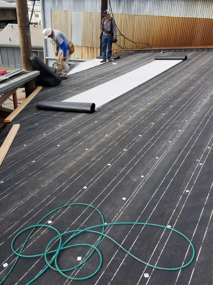 Slide of Rivera Roofing Systems