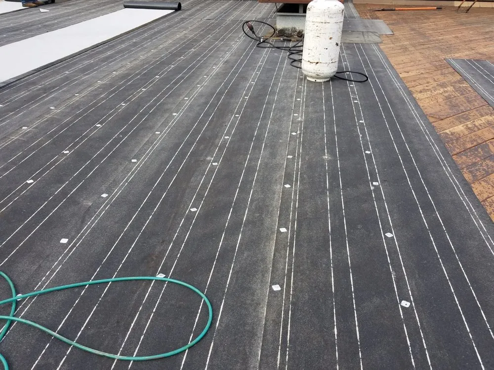 Slide of Rivera Roofing Systems