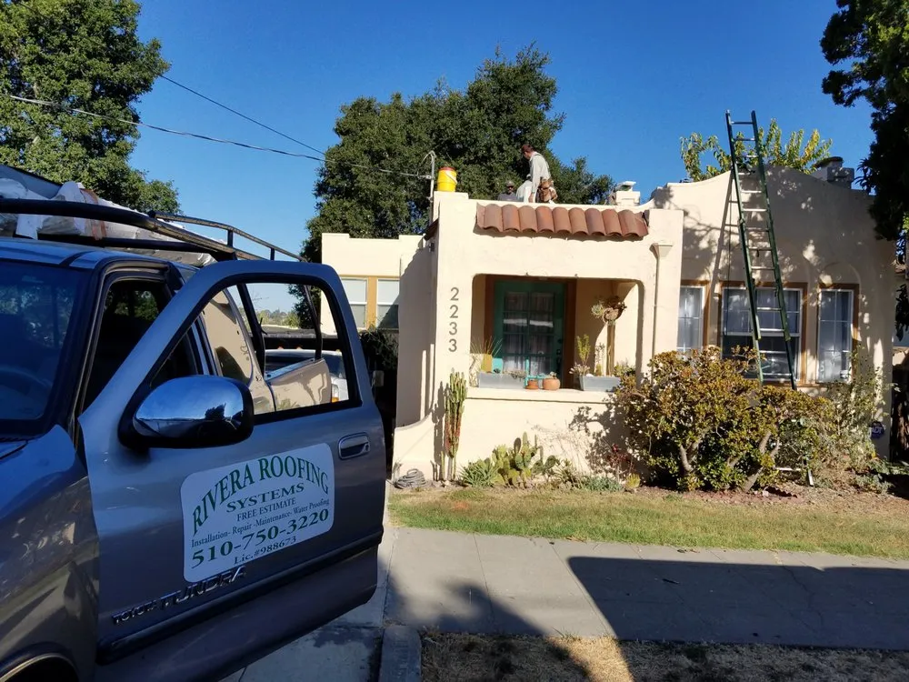 Slide of Rivera Roofing Systems