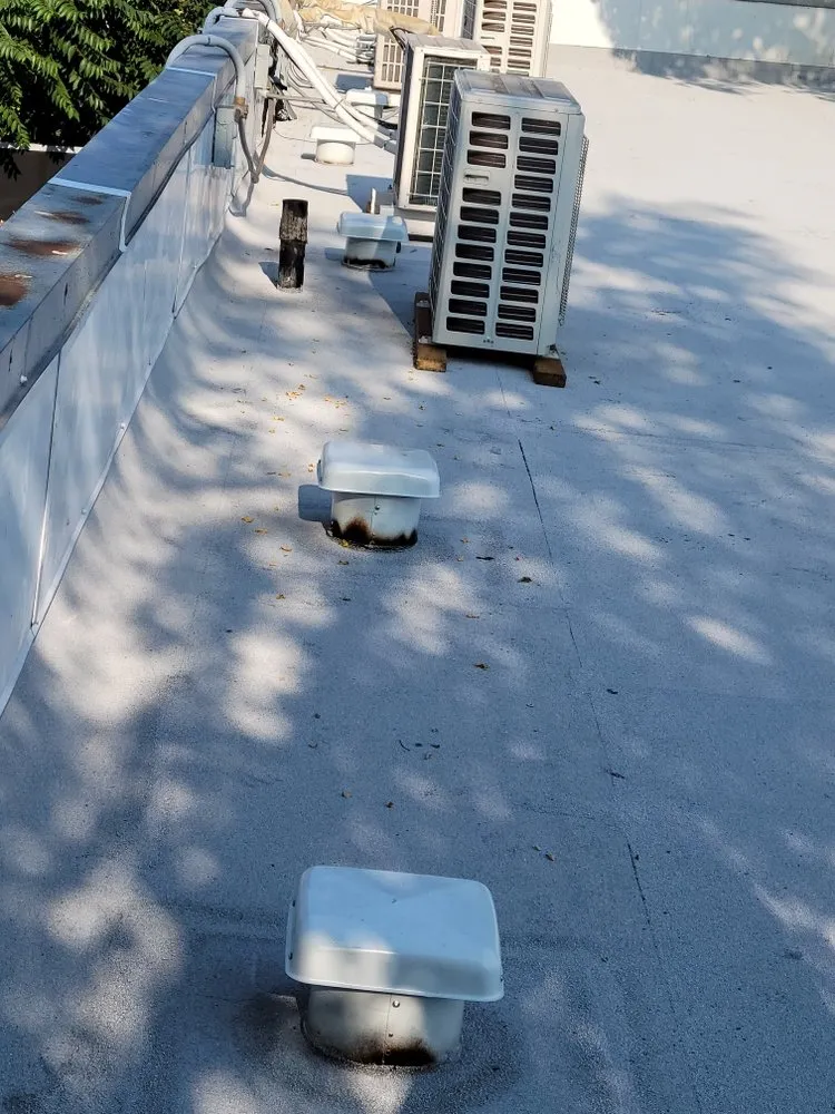 Slide of Riveras Roofing Services