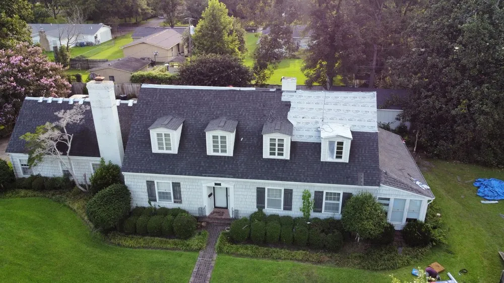 Slide of RiverLand Roofing