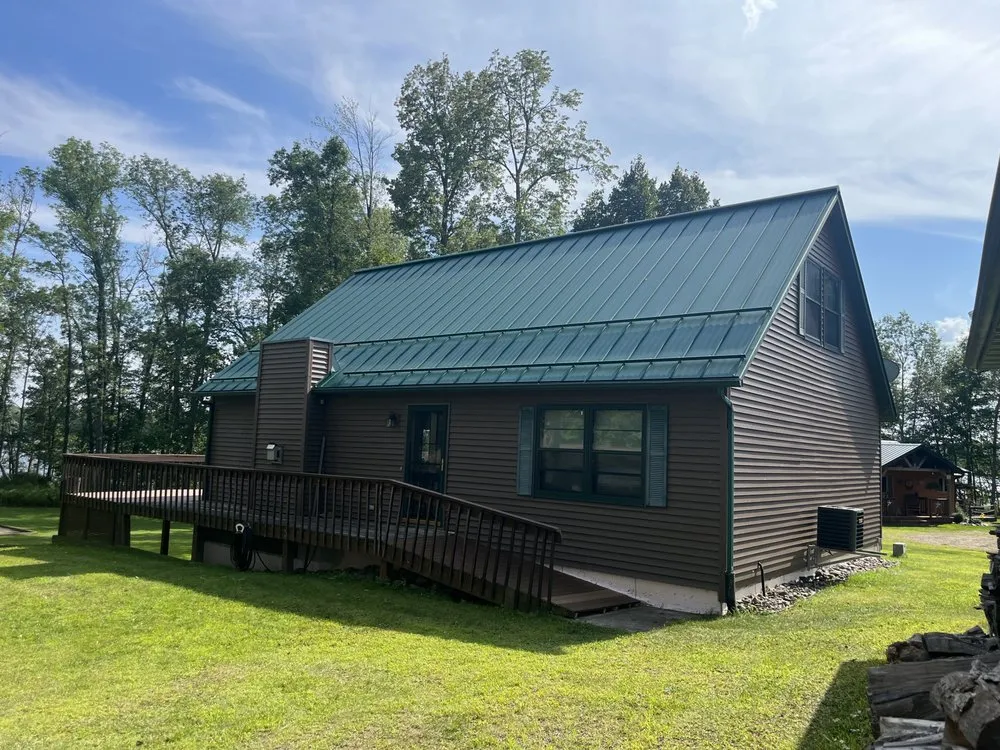 Top-rated storm damage roof repair for fast service in Withee, WI by Rivers Edge Metal Roofing
