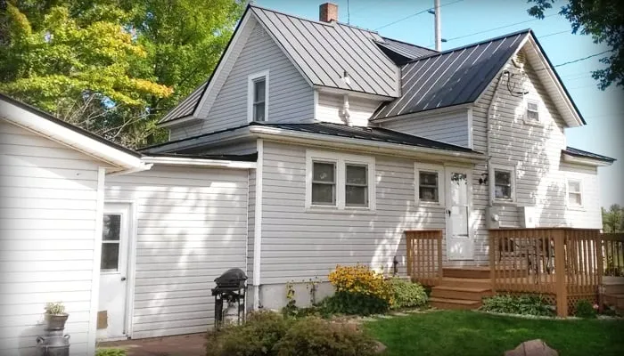 Emergency flat roof repair experts serving Withee, WI - Rivers Edge Metal Roofing