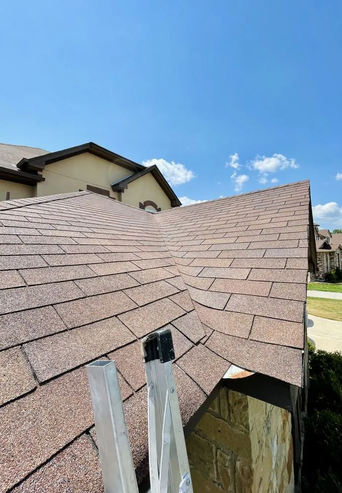 Slide of Riverside Roofing ATX