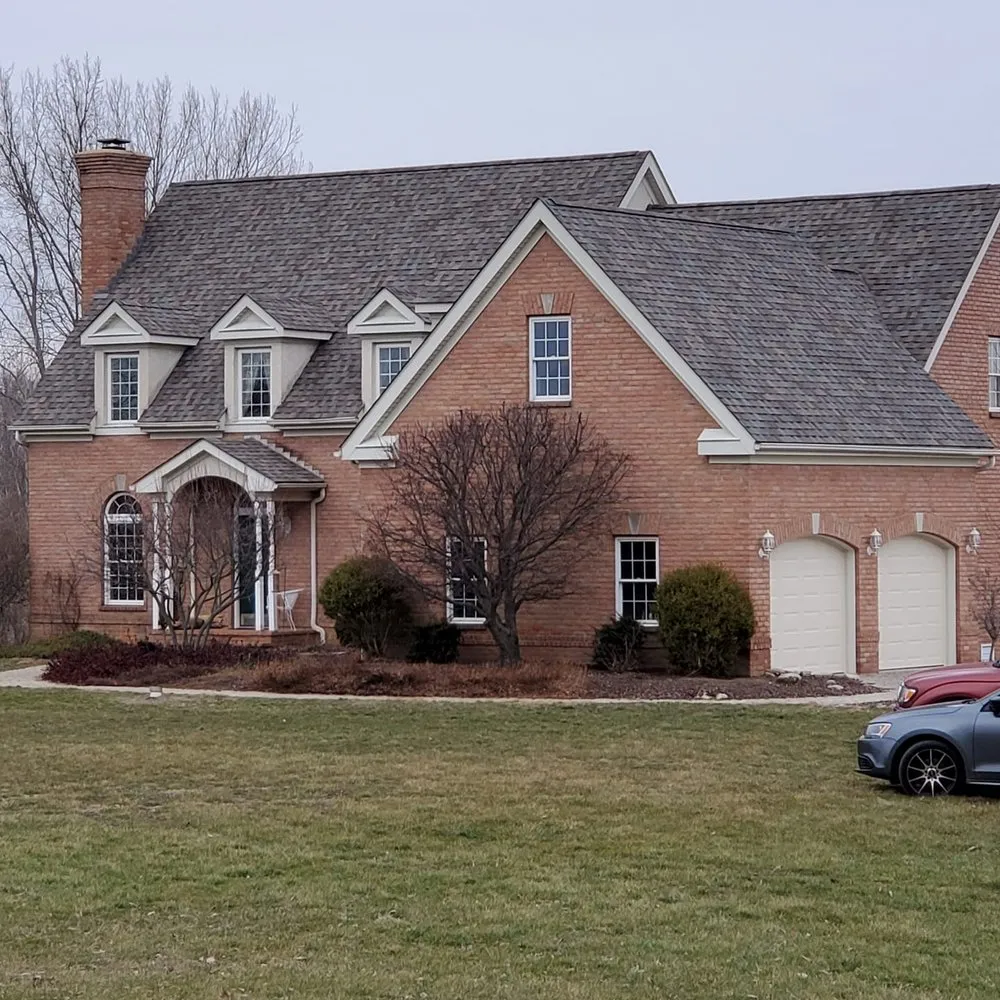 Slide of Rivertop Roofing