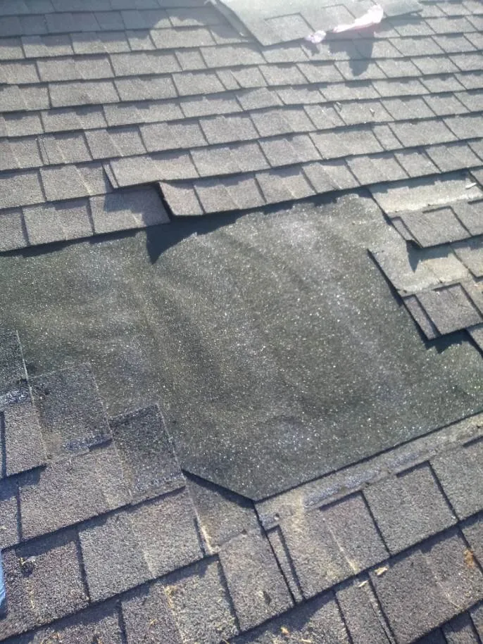 Slide of Rizzo Roofing