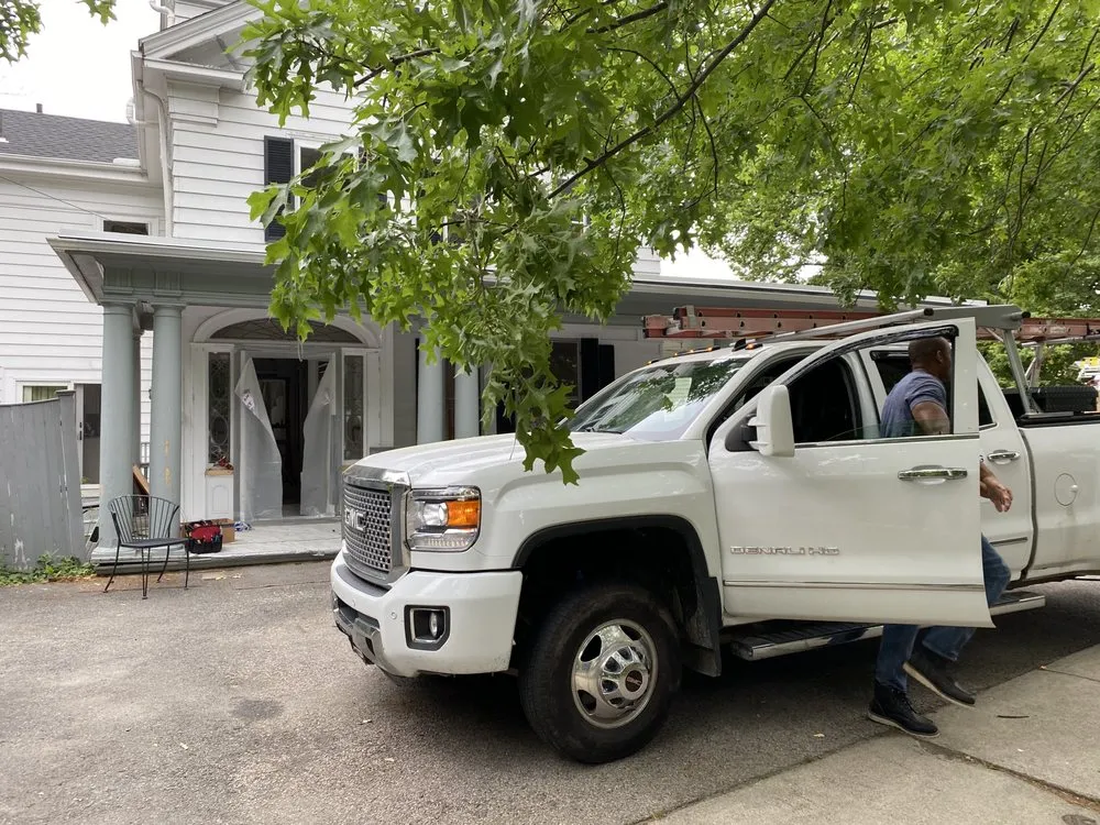 Slide of RJ John Roofing