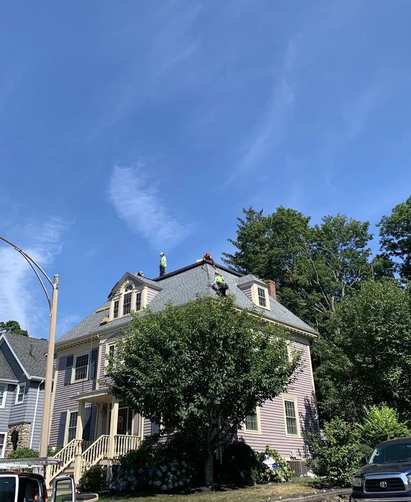 Slide of RJ John Roofing