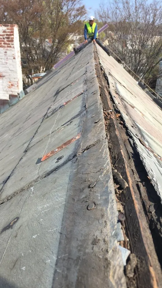 Slide of RJ John Roofing