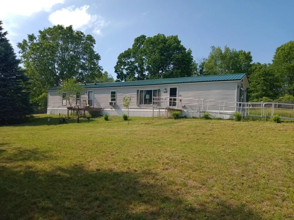 Slide of RJ Metal Roofing and Seamless Gutter Solutions