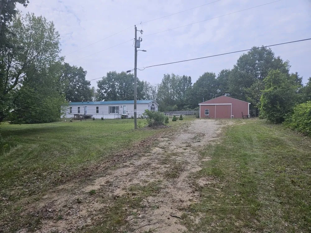 Slide of RJ Metal Roofing and Seamless Gutter Solutions