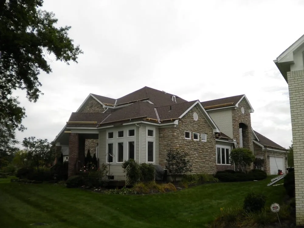 Slide of RJK Roofing Solutions