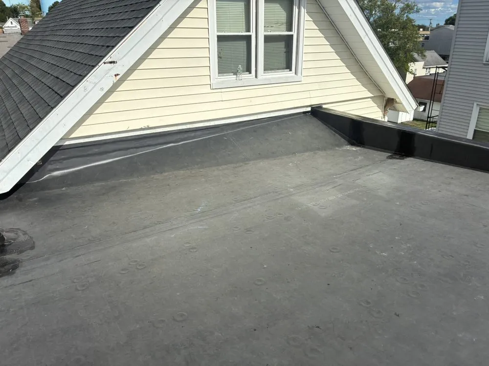 Slide of RJM Best Roofing