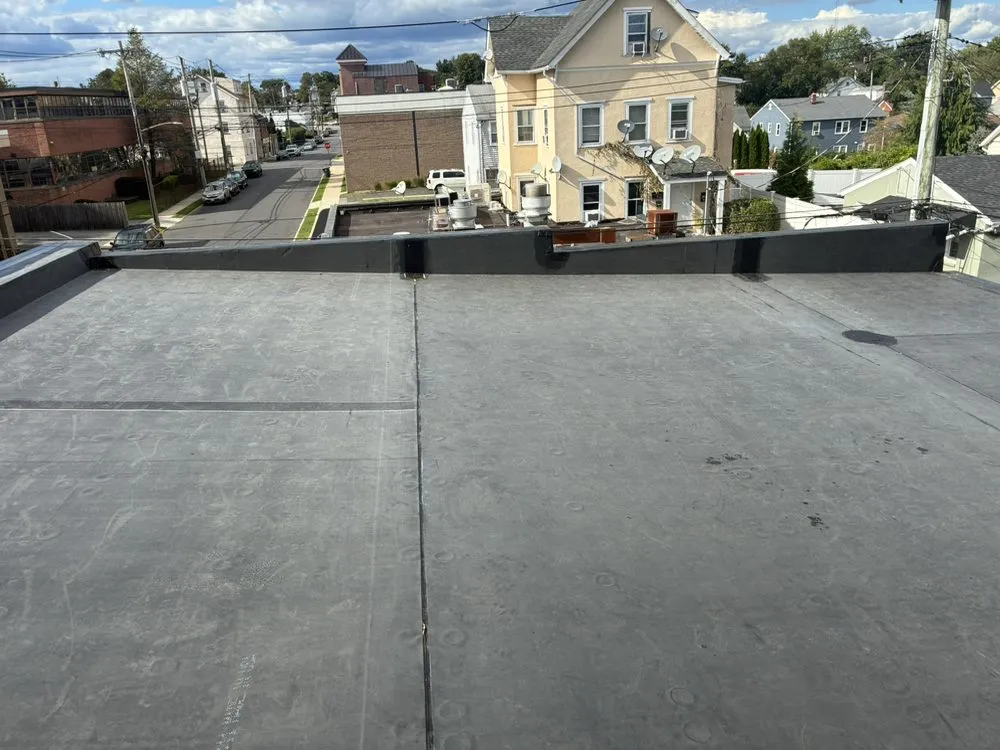 Slide of RJM Best Roofing
