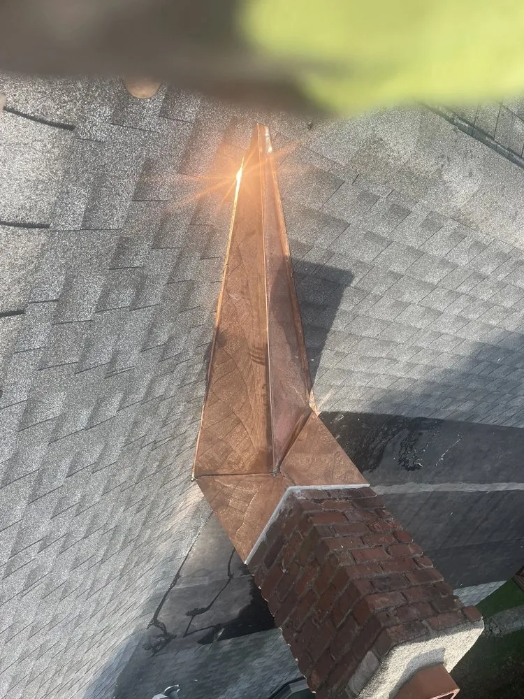 Slide of RJM Best Roofing