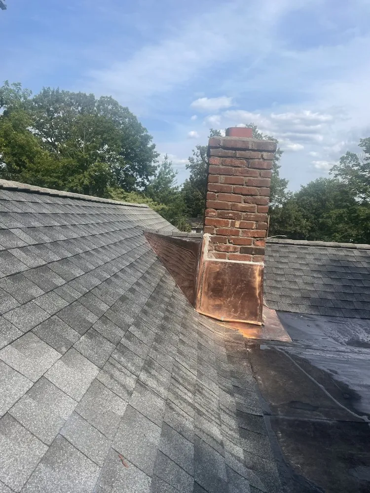 Slide of RJM Best Roofing